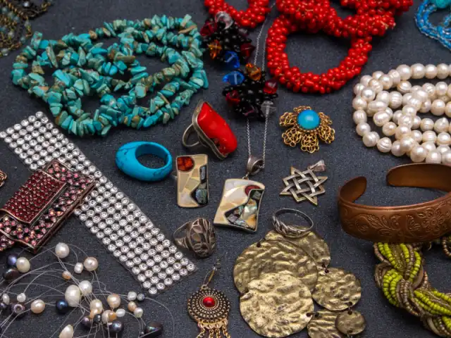 Funda Sourcing fashion jewelry product sourcing image with necklaces, bracelets, earrings, rings, and seasonal jewelry lines
