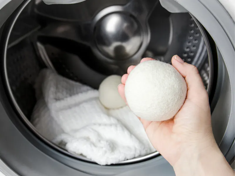 Funda Sourcing wool dryer balls product sourcing image with reusable dryer balls, bundles, scents, bags, and retail-ready packs