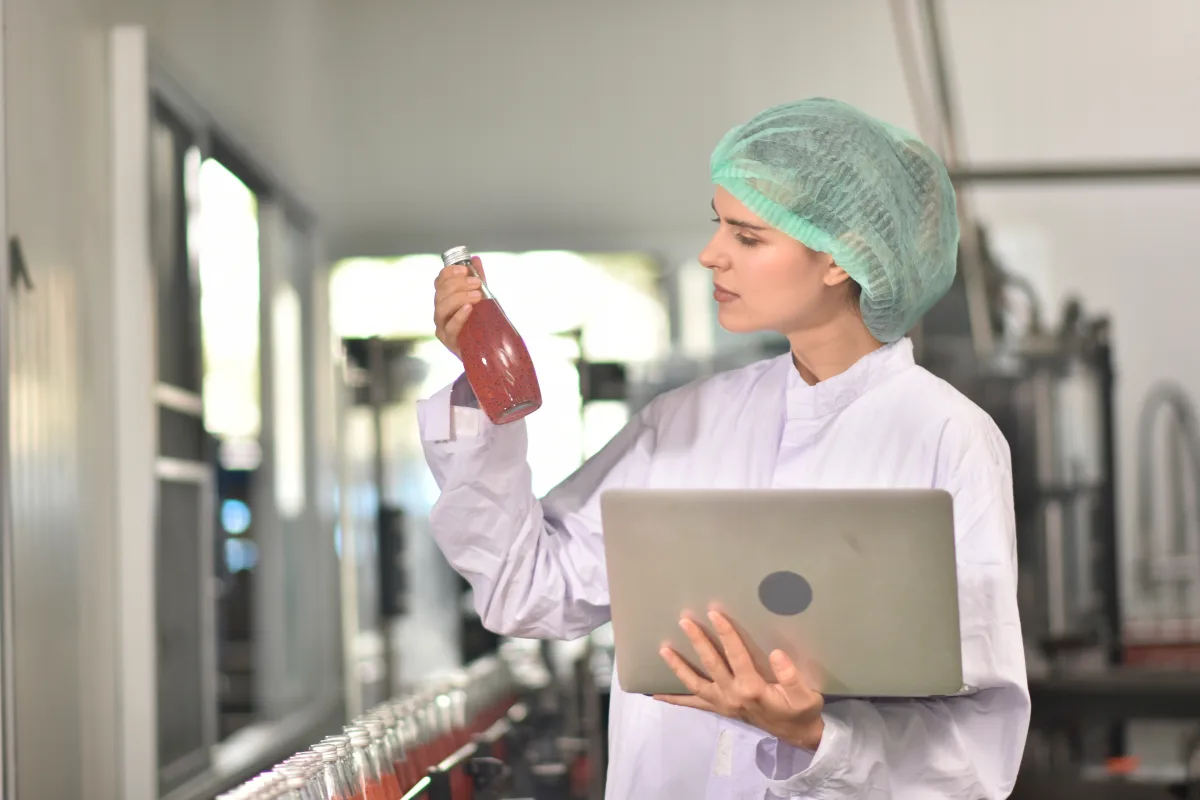 Approved sample compared with production output during quality review